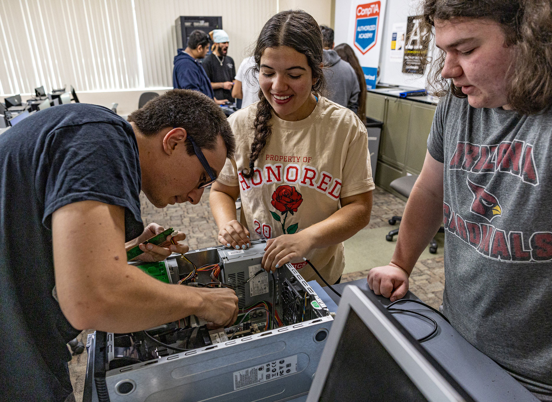 Students rewiring a computer