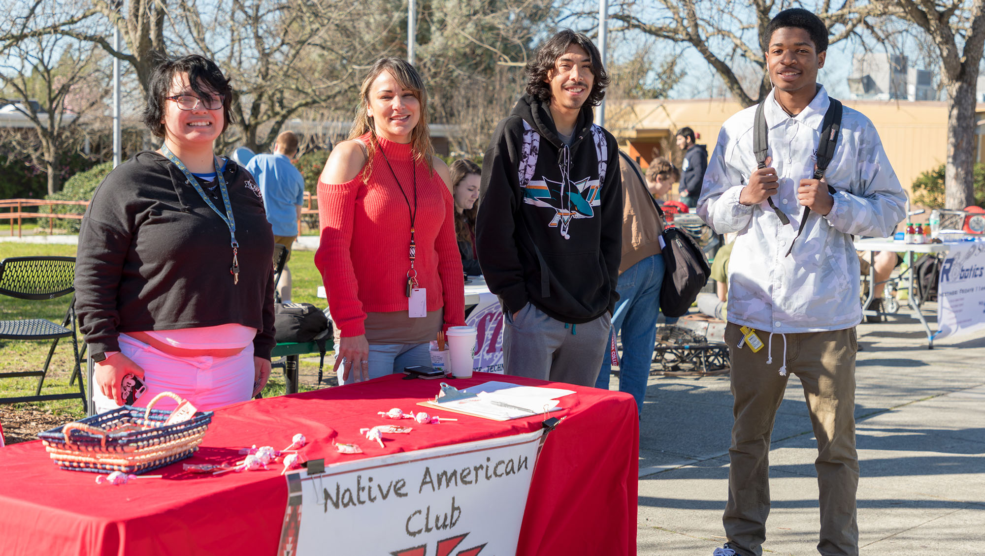 Four students at the Native American Club booth during Sierra College's Wolverine Week