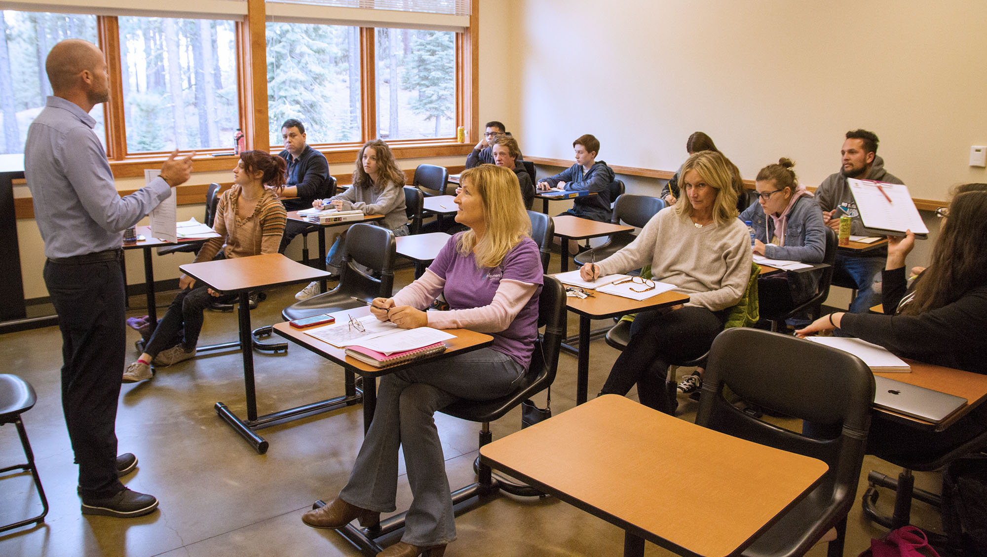 Instructor in front of a twelve student classroom at the Sierra College Tahoe Truckee campus
