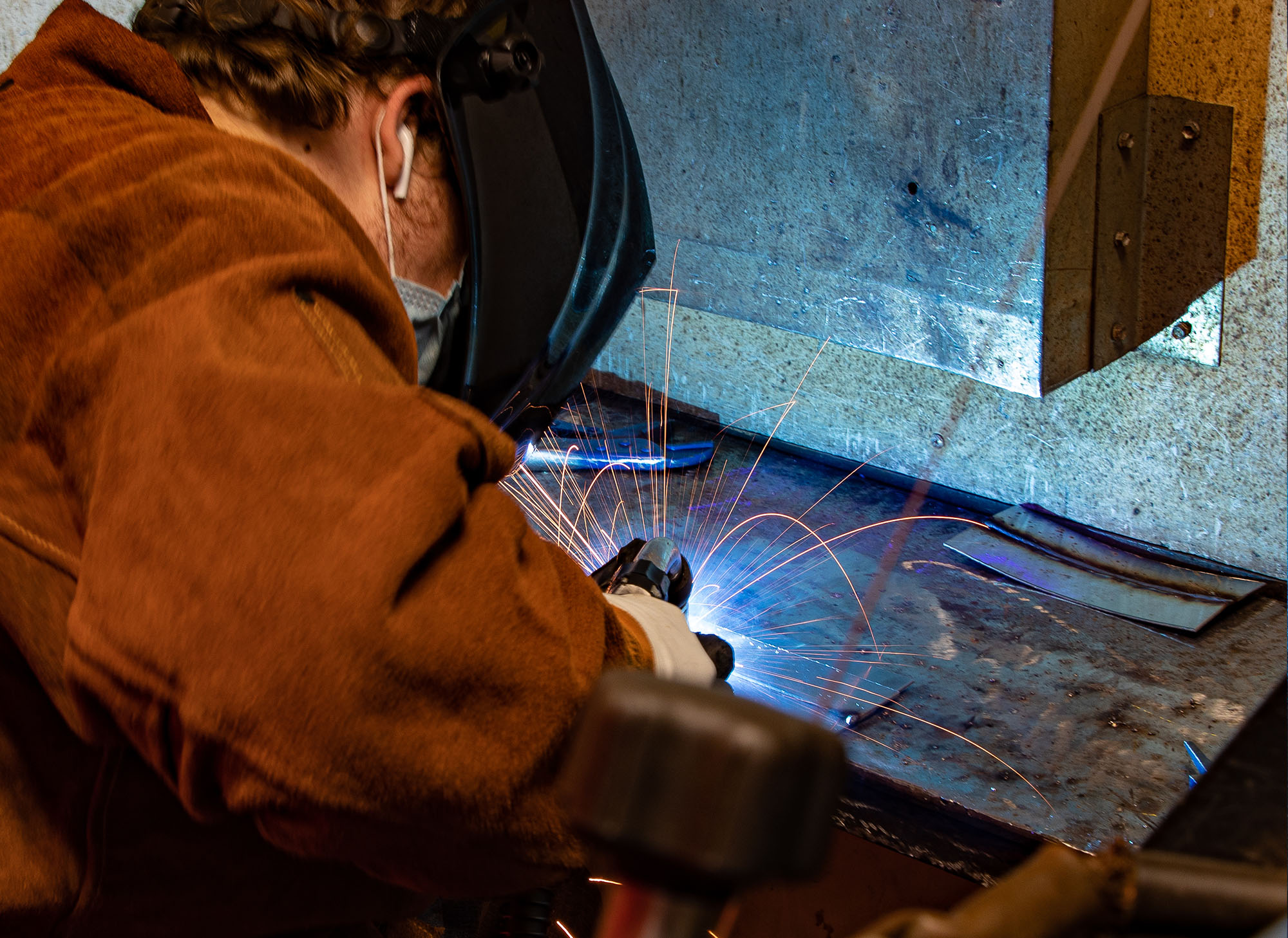 Welding Technology student working on a project wearing safety equipment