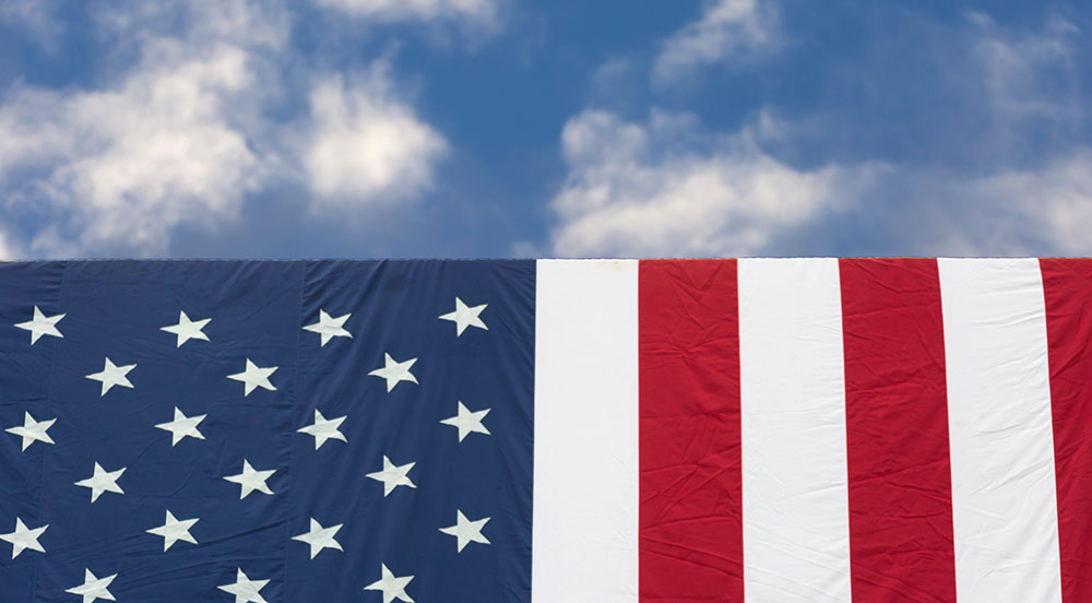 United States flag against blue sky on Veterans Day