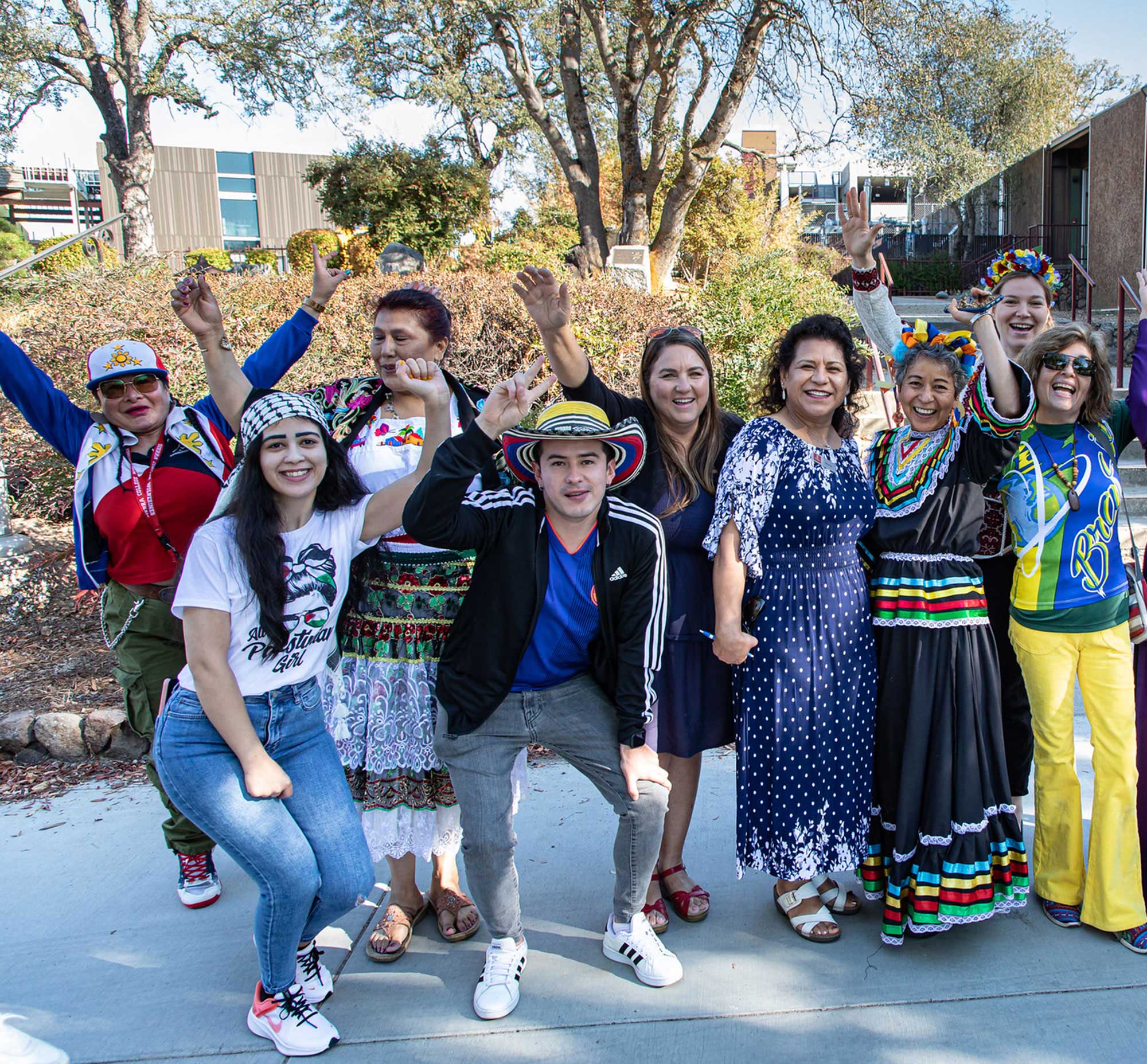 A group of Latino and Latina people celebrate their culture